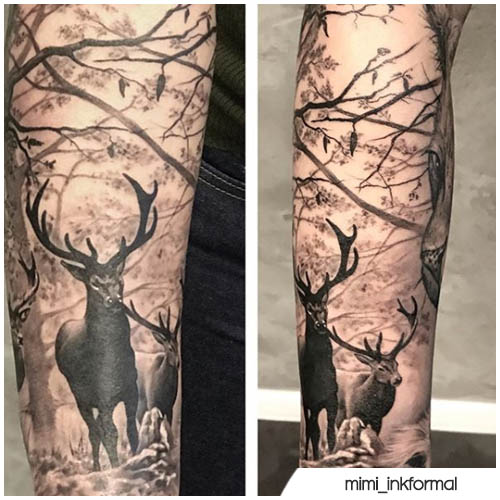 tatuaje de ciervo en el bosque