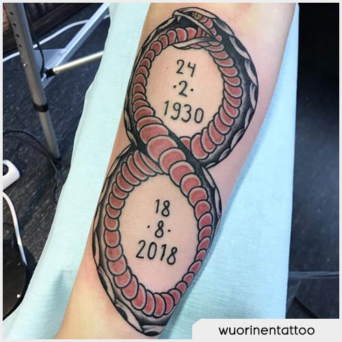 tatuaje de la fecha de ouroboros