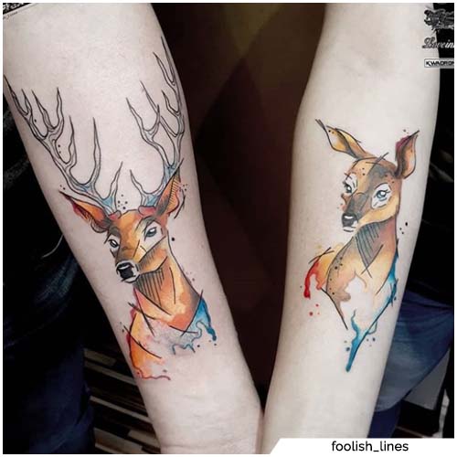 tatuajes de ciervos y pareja trasera
