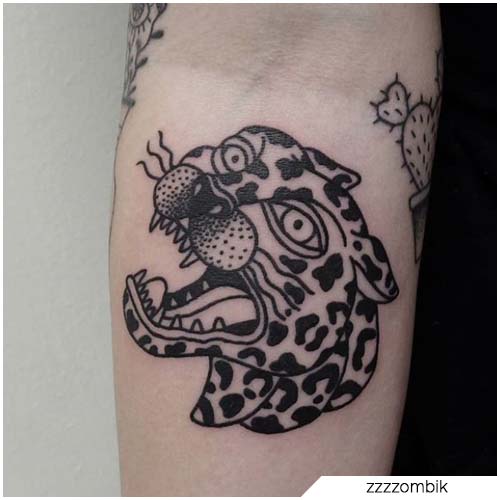tatuaje leopardo blackwork tradicional