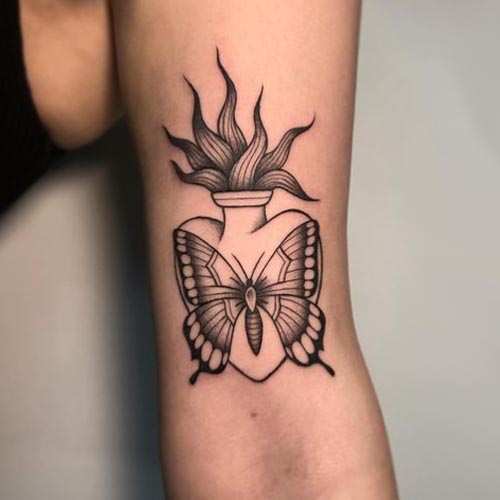 sacro cuore tatuaggio farfalla